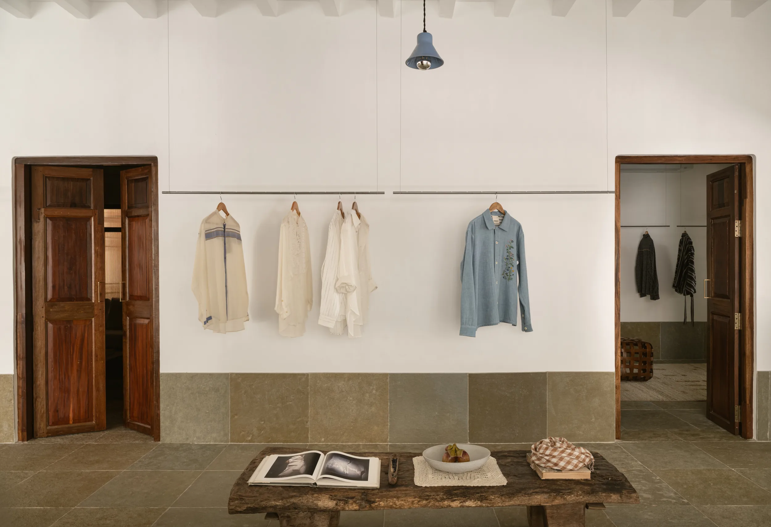 Main retail space with Tandur stone flooring and timber interiors