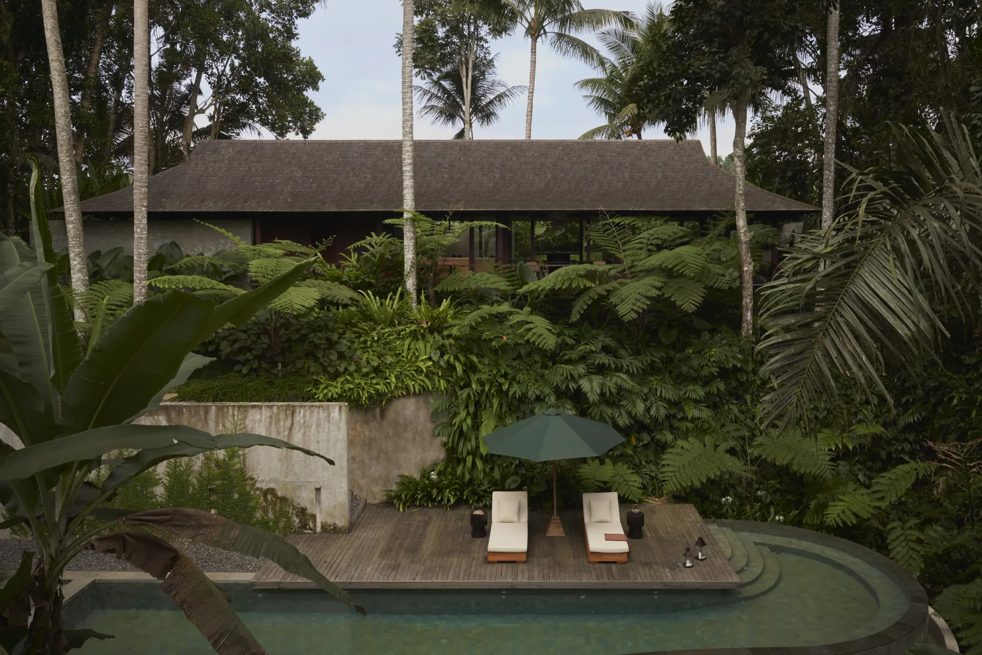 Bangkirai timber structure and deep roof overhangs at Rumah Haruku in Bali