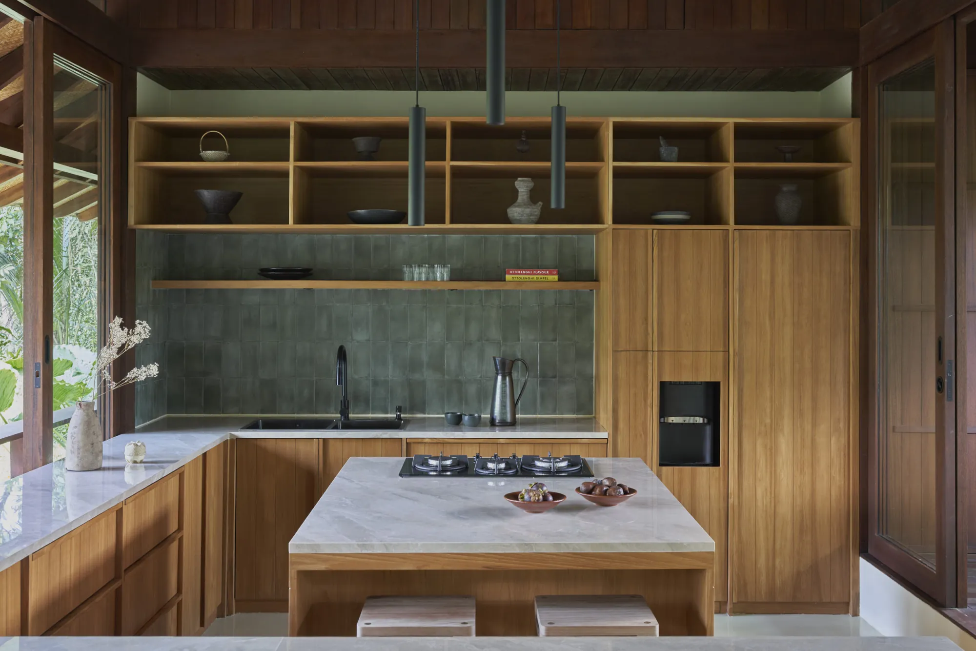 Bangkirai timber kitchen with terrazzo and cement tiles at Rumah Haruku in Bali