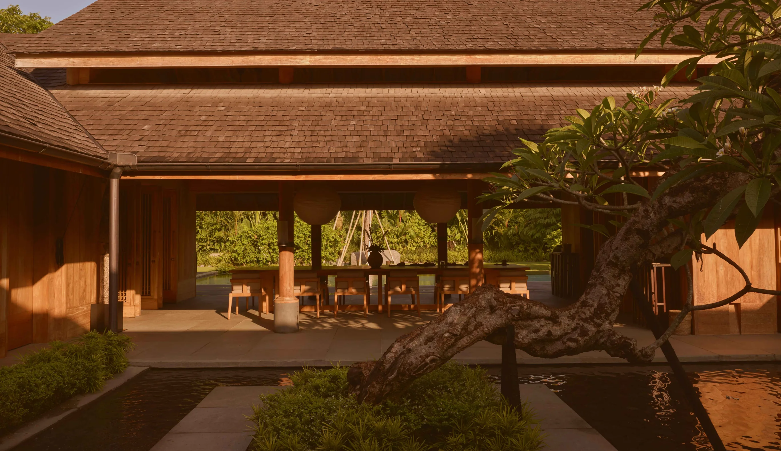Rumah Rubah teak villa surrounded by tropical planting in Pererenan, Bali