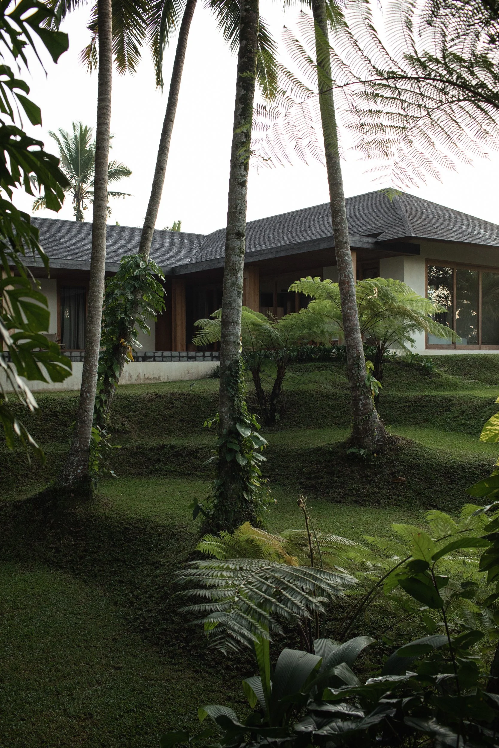 Pejeng House opening toward its tropical garden