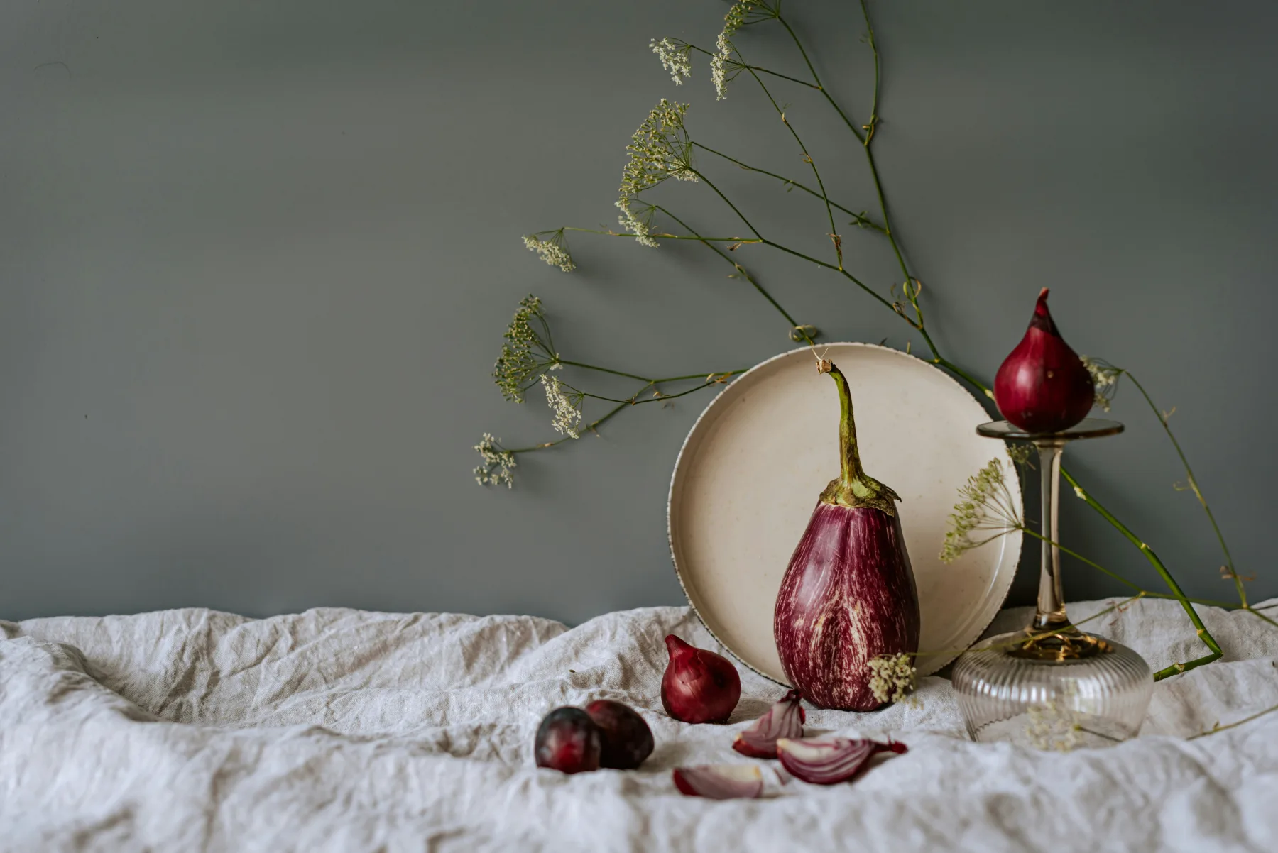 Tropical vegetables and fruits styled as natural decor on a table