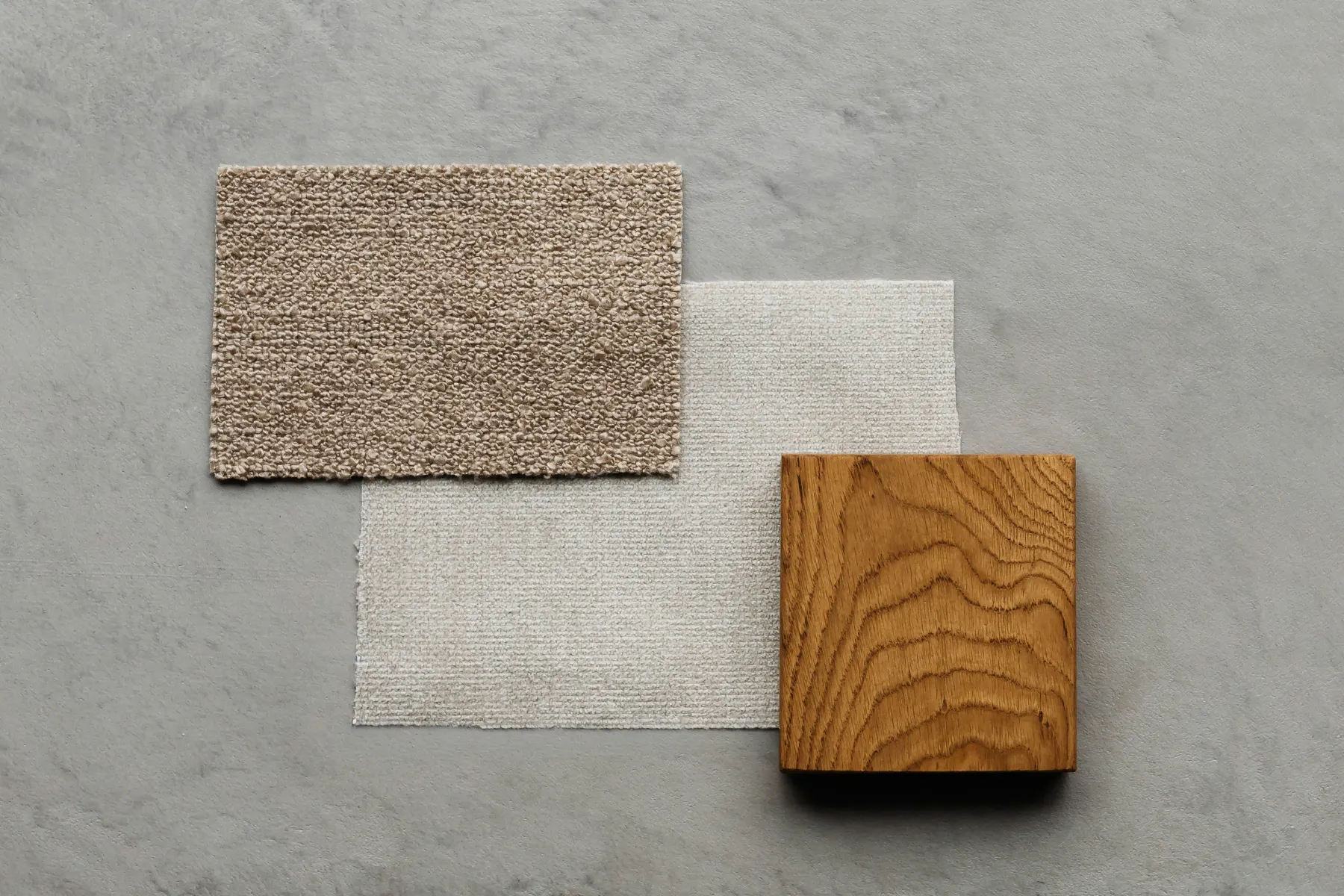 Soft earth-toned tropical living room palette with warm neutrals, timber, clay, and muted natural colour